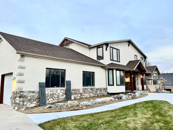 Freshly painted home exterior by Godspeed Services in Utah County